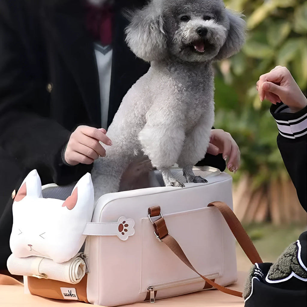 Beige hard-shell cat carrier with one shoulder strap showing EPE padding construction