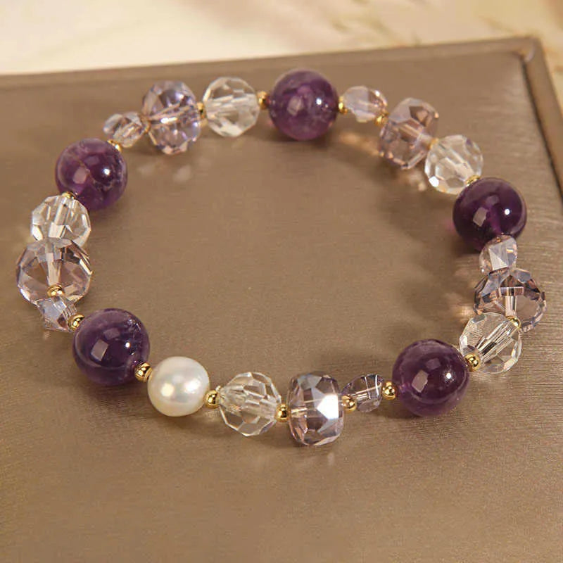 Women's artificial amethyst bracelet with pearl pendant and four-leaf clover charm on U-shaped design