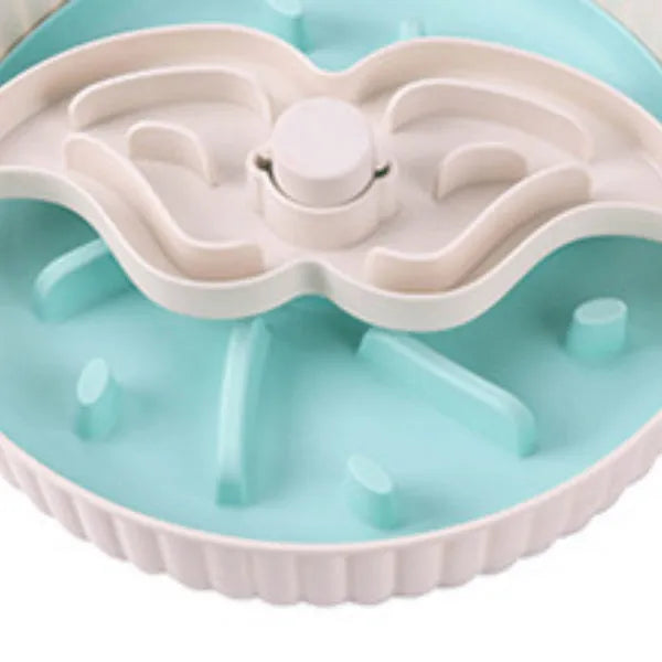 Colourful rotating pet slow feeder bowl with a silicone licking mat in a windmill design.
