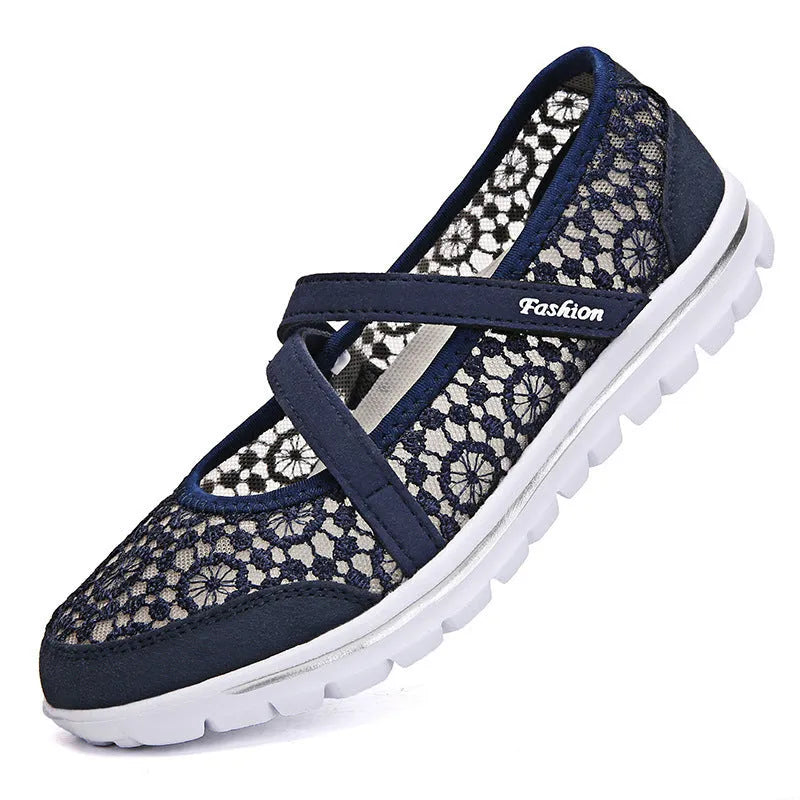 Women's beige mesh lace-up casual flat shoes with round toe and sewing line detail.