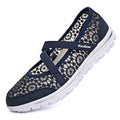 Women's beige mesh lace-up casual flat shoes with round toe and sewing line detail.