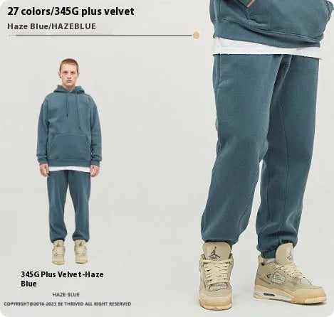Men's solid colour cotton velvet sweatpants with elastic waist and ankle banding detail
