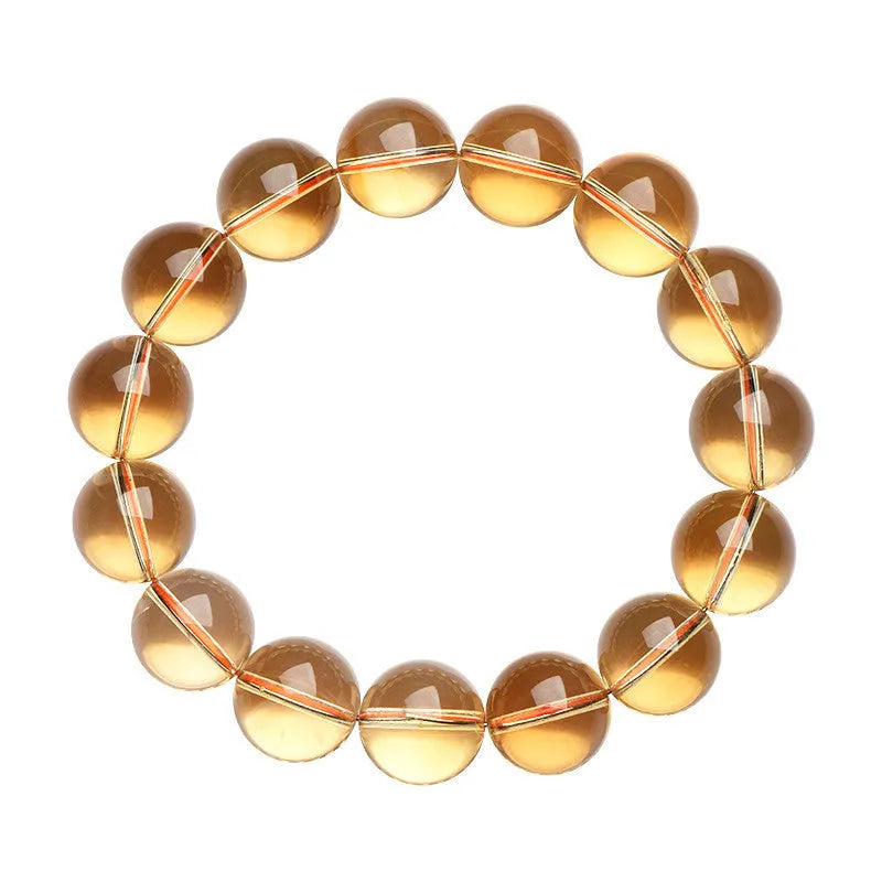 Natural citrine scattered beads ball bracelet showing golden polished stones on a wrist, available in 7A and 6A grades.