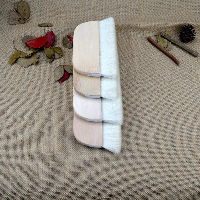 Wool brush for mounting paste application on artwork boards