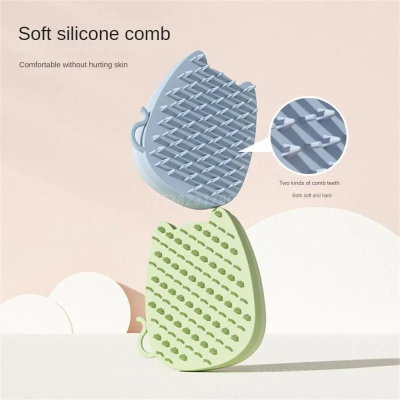 Blue silicone pet grooming comb sponge with dual-texture bristles on a white background.