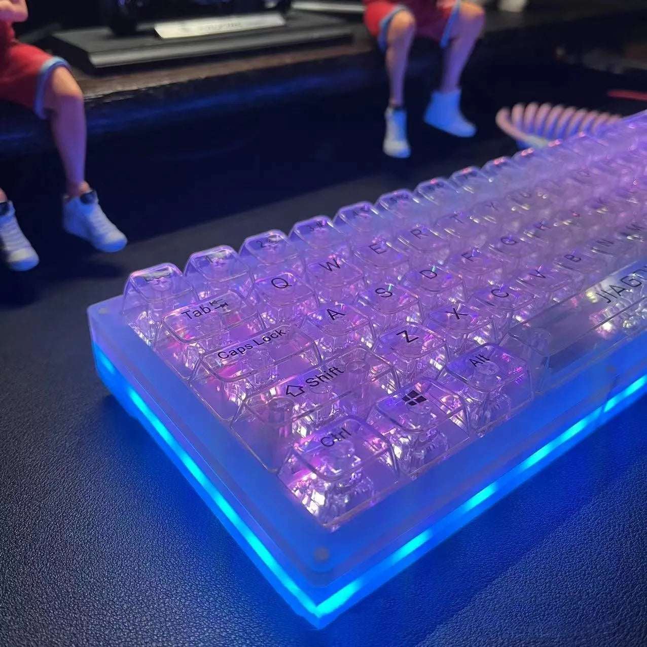 Universal transparent plastic 132-key keyboard key cap set laid out on a table.