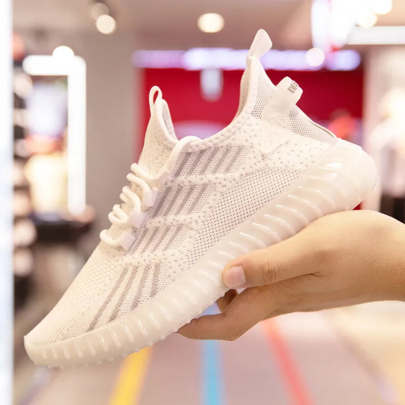 Men's breathable flying fabric sports shoes in white colour showing mesh lining and platform heel design