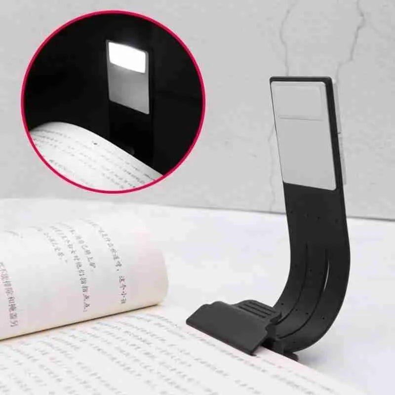 LEDGLE black USB rechargeable flexible clip LED book light with frosted panel and silicone arm on an e-reader