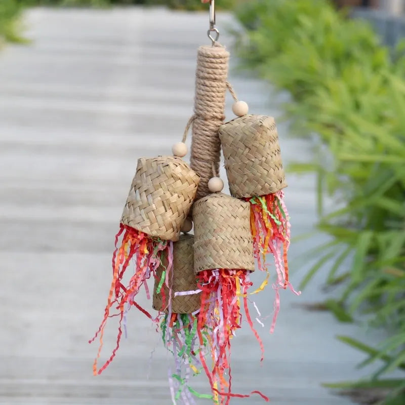 Parrot foraging toy made of wood and sisal rope with colourful shredded paper inserts
