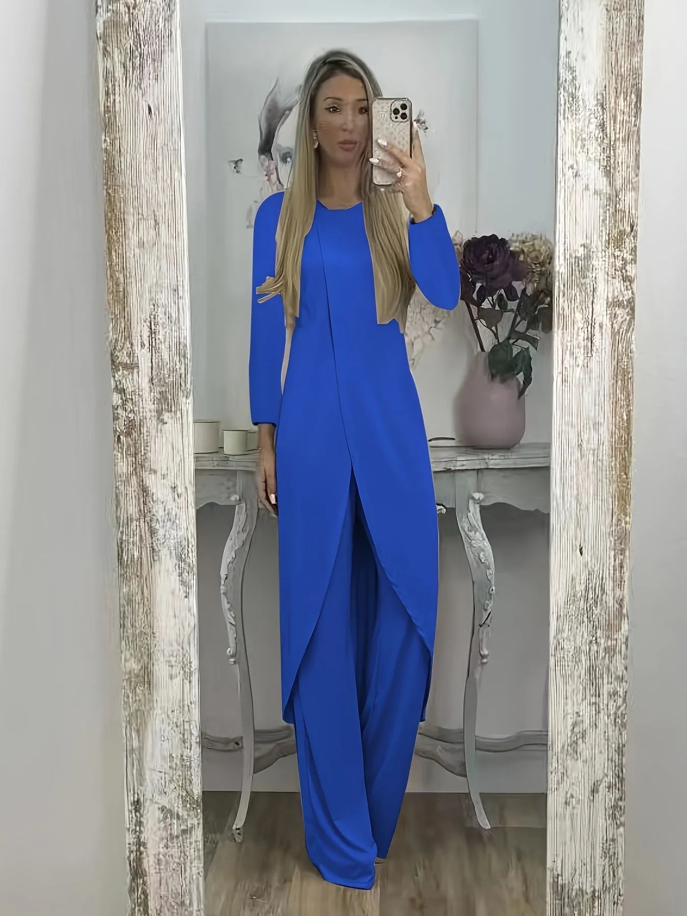 Women's casual two-piece lounge set showing long sleeve top and trousers in loose fit