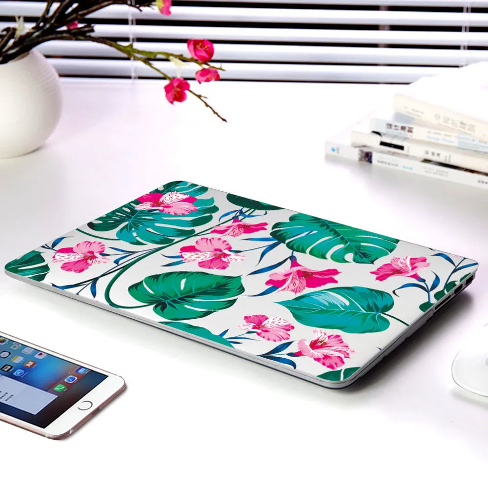 Plastic laptop protective shell with a floral pattern design for MacBook Air and MacBook Pro models.