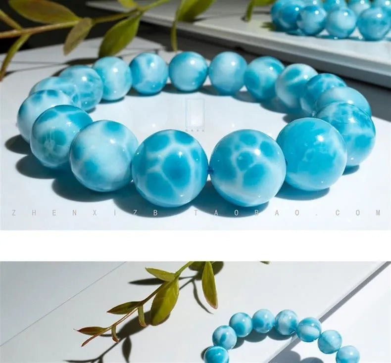Blue handmade Bodhi bracelet with natural crystal, sea-pattern stone, and pearl in Maillard style.