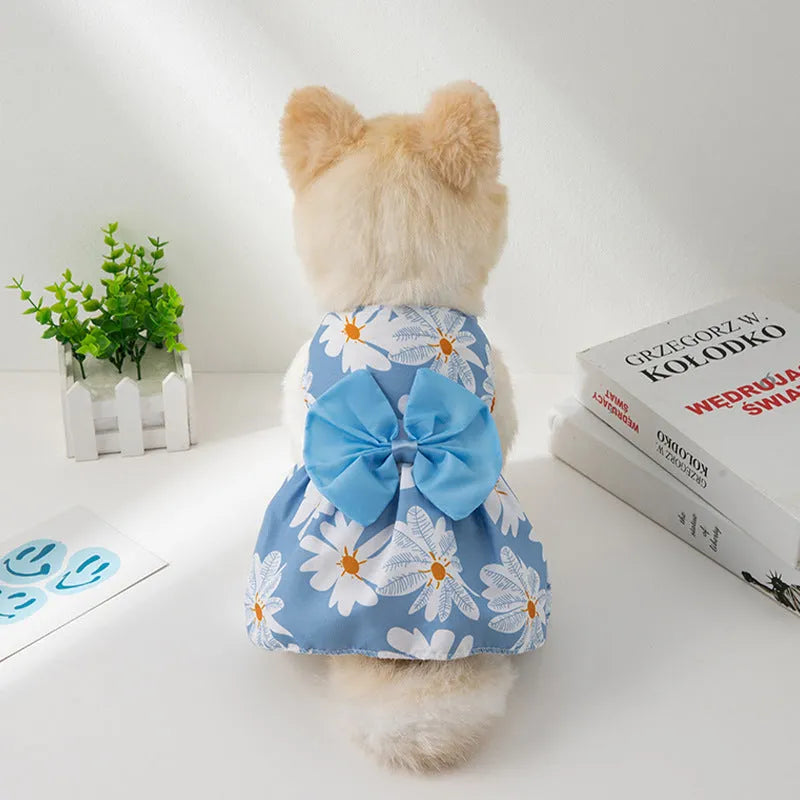 Ultra-thin floral print pet dress for dogs or cats with a large knotted bow at the chest.