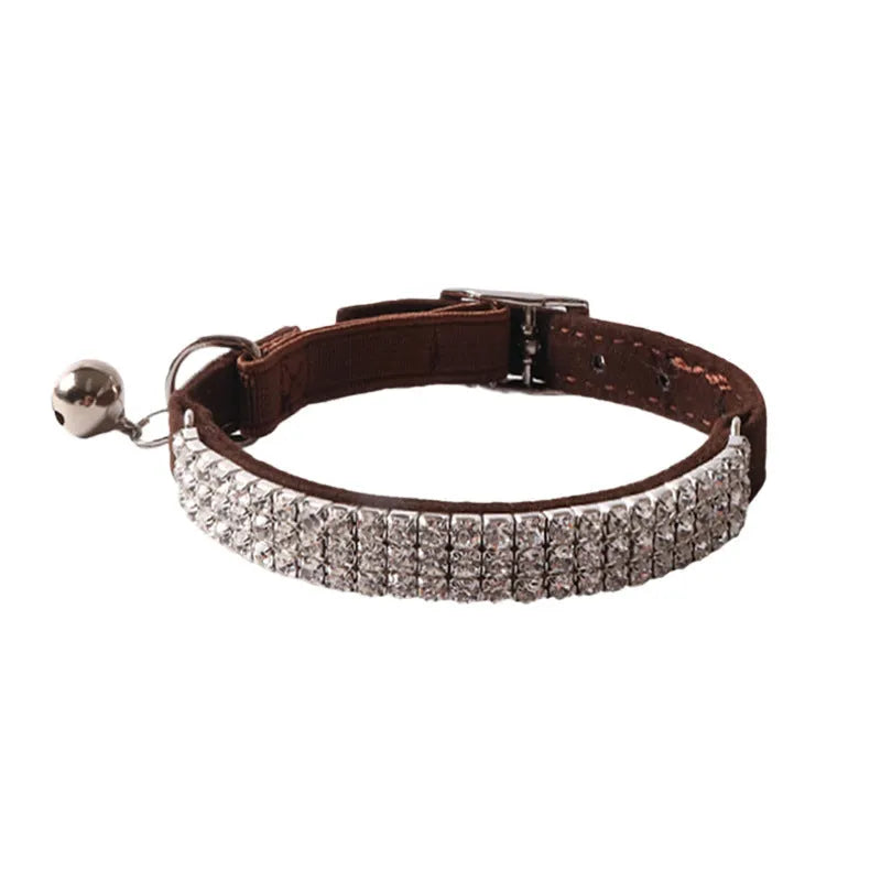 Flocked elastic cat collar with quick-release buckle shown in pink, length 28cm.
