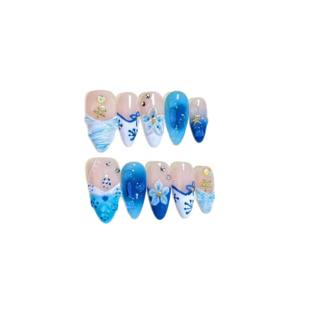 Set of hand-painted blue plastic fake nails with carved Summer Ice design in four sizes XS S M L