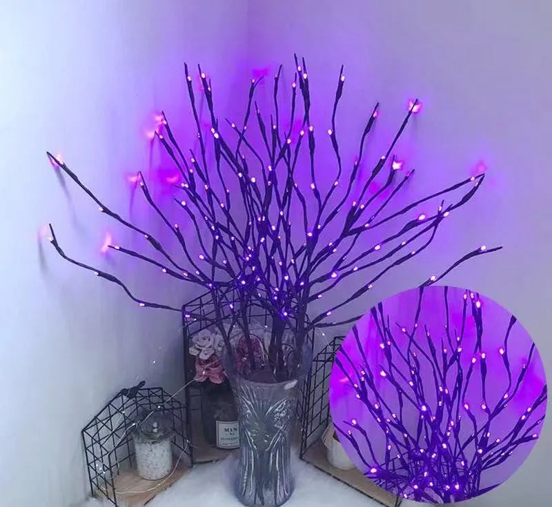 Silver branch LED decorative tree lamp with colour-changing lights in a vase base.