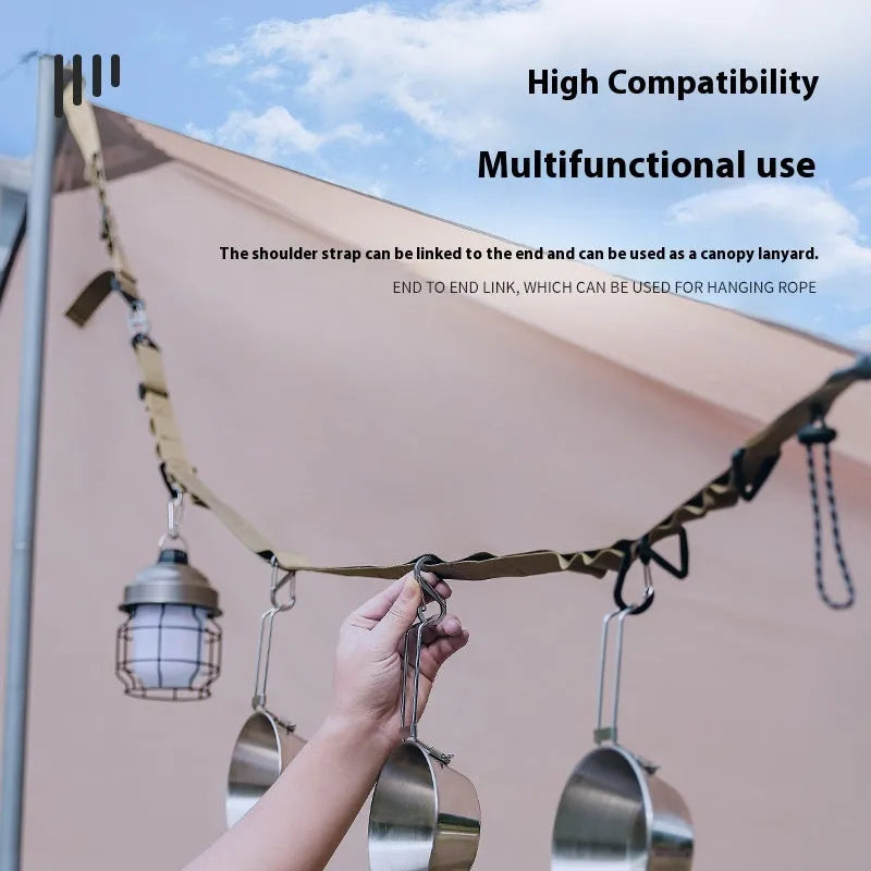 130cm long black outdoor hanging rope clothesline and storage belt laid out flat.