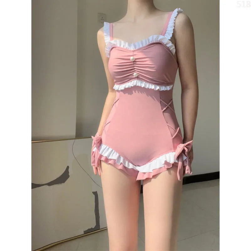 Pink and blue one-piece swimsuit in milk silk fabric with sleeveless design