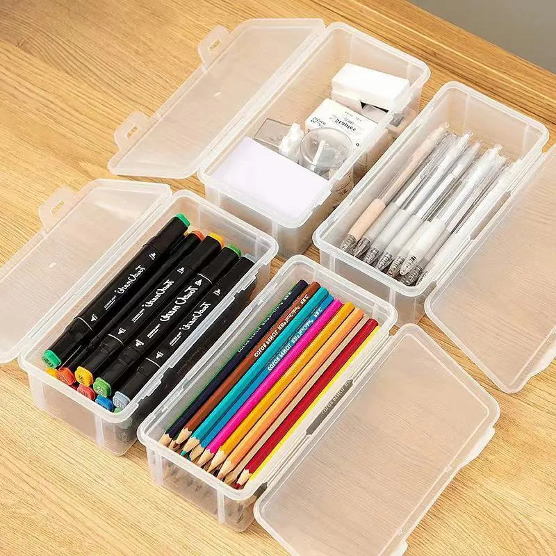 Large transparent plastic storage box full of coloured pencils and crayons