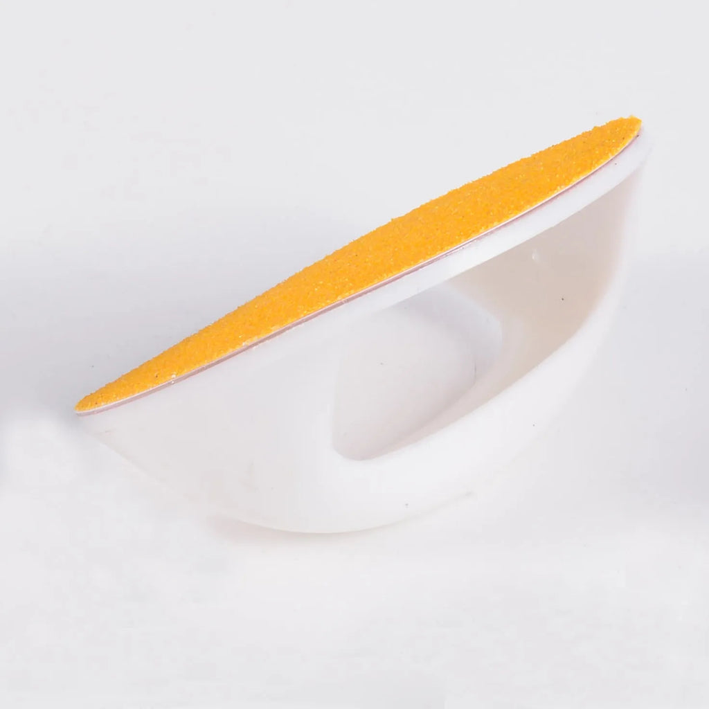 Square dog nail file with ergonomic handle in blue colour on a table