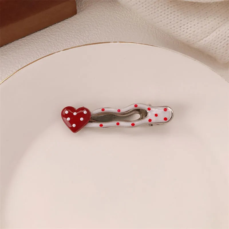 Red stereo love heart-shaped hairpin with French retro dots and willow leaf design
