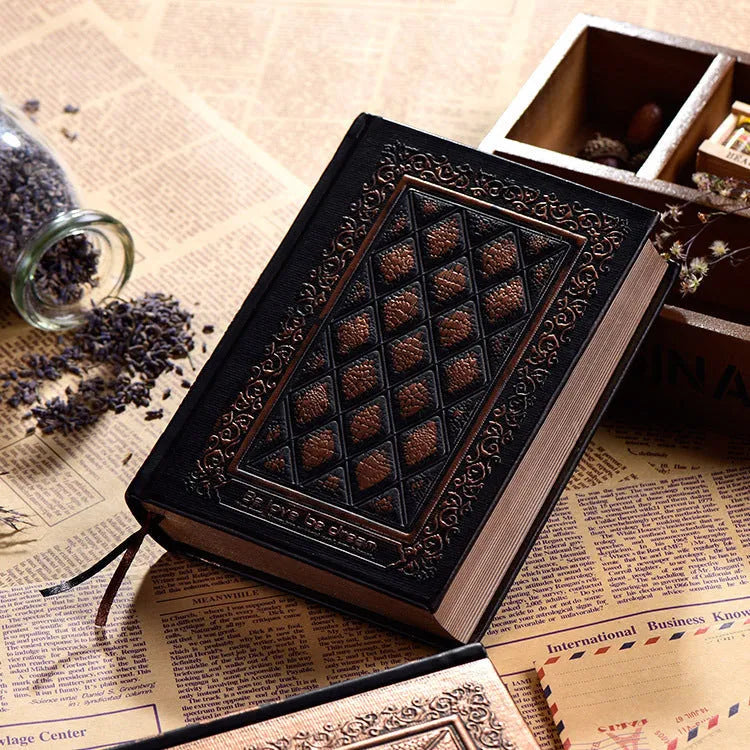 Embossed faux leather notebook with textured three-dimensional cover in bronze colour option