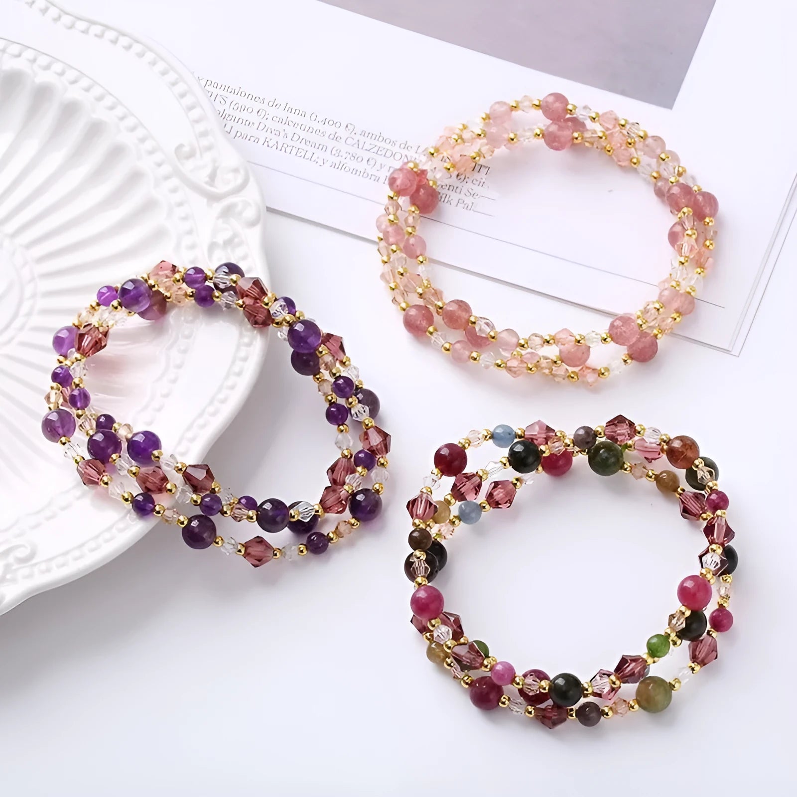 Handmade women's adjustable bracelet with three amethyst, strawberry quartz, or tourmaline crystal stones.