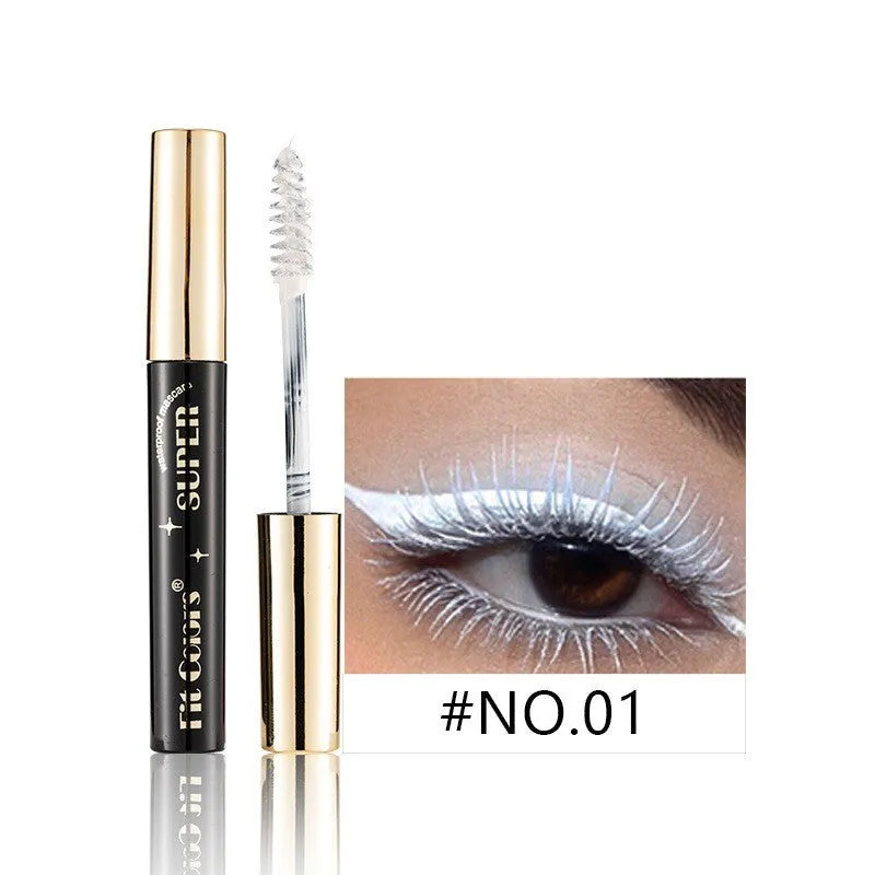 Christmas stage mascara tube with wand, shown in multiple colour options including gold, purple, and wine red