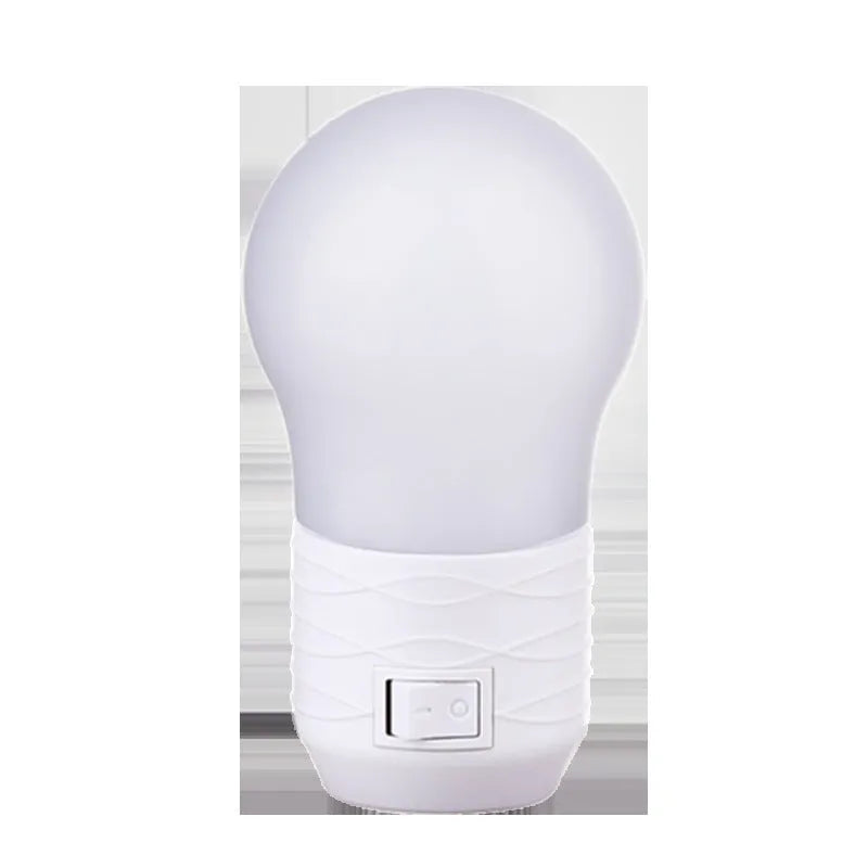 Plug-in bedside baby night feeding lamp in round modern design measuring 45x90x45mm
