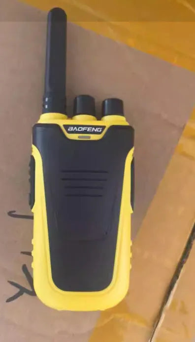 Red and yellow coloured high-power children's intercom walkie talkie with USB charging port.