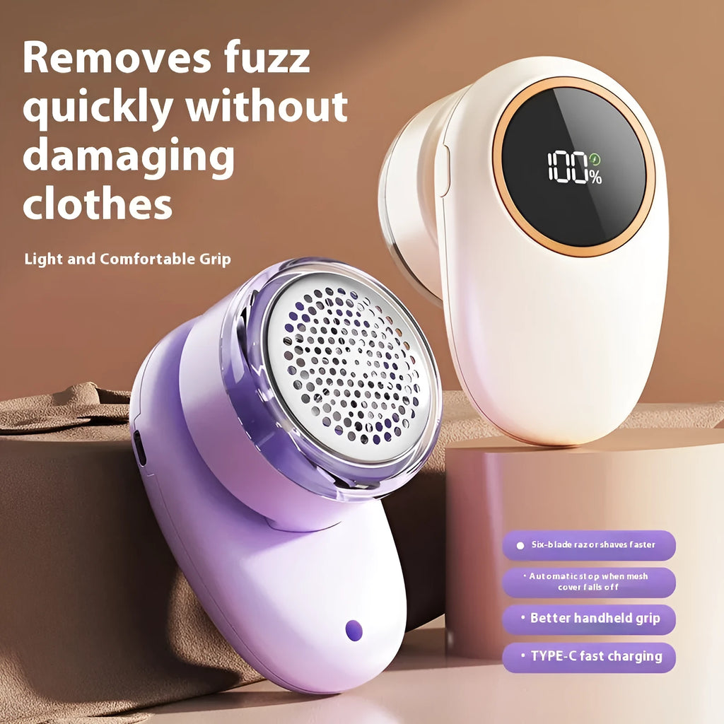 Beige and purple digital fur ball trimmer lint remover with selectable cutter heads on a table