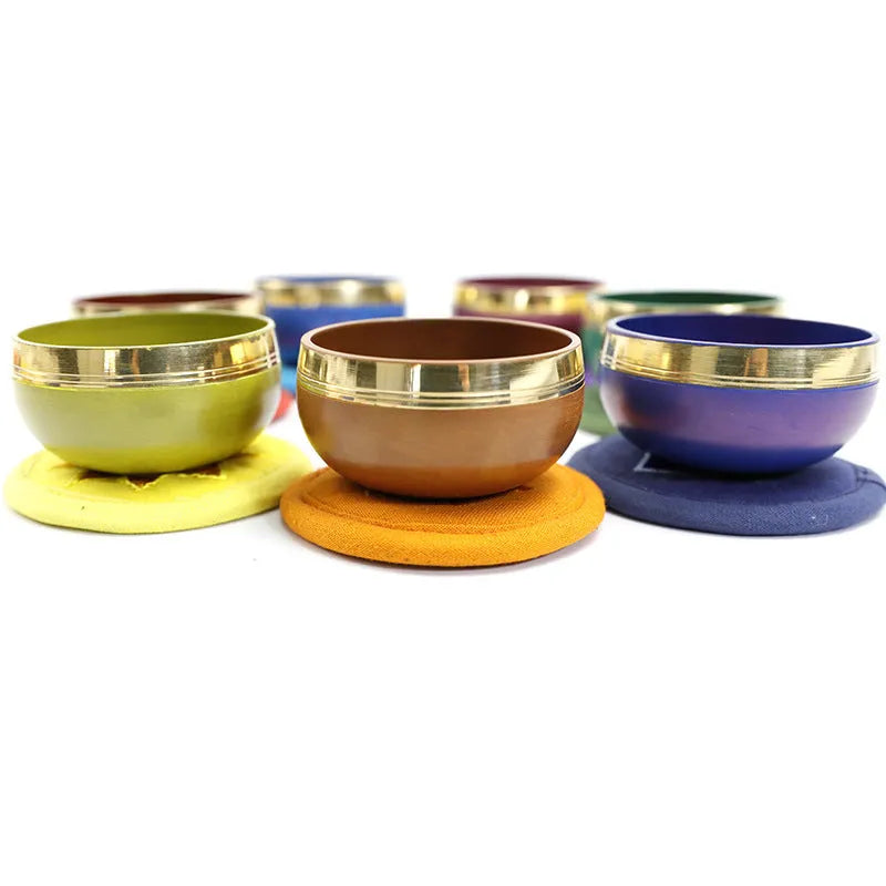 Handmade colourful Himalaya metal singing bowl and mallet, 7.8 cm in diameter.