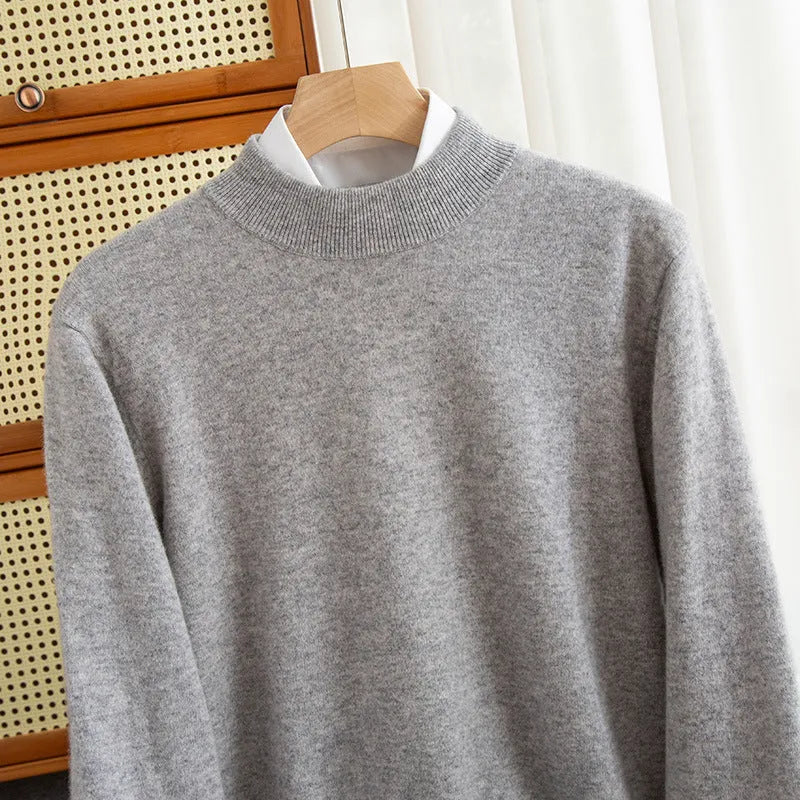 Man wearing a half-turtleneck wool sweater in camel colour, loose fit, for winter.