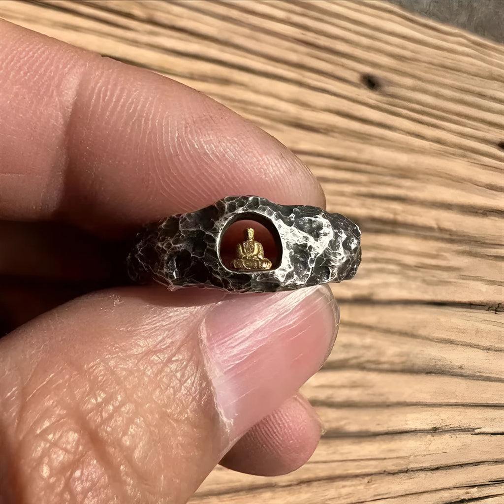 Hand-forged copper grotto Buddha ring with a rock texture finish, shown in size 8.