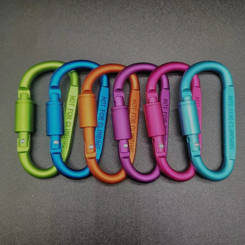 Aluminium D-type screw-lock carabiner in red, showing its 8cm size and flat-sided shape.