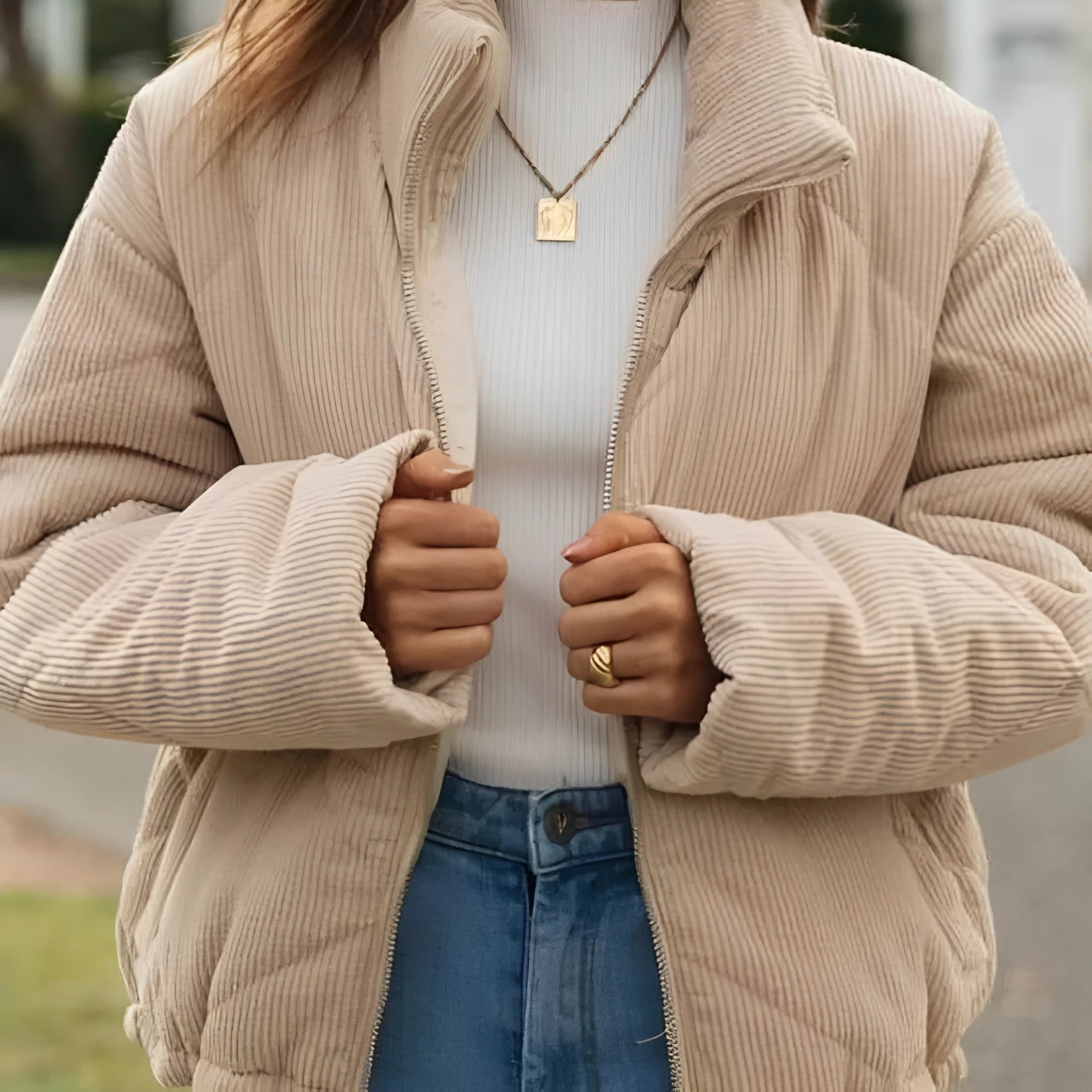 Apricot coloured women's corduroy jacket with a stand collar and zip-up front.