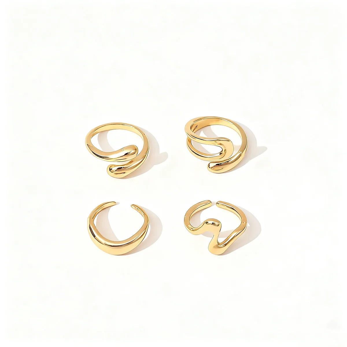 Open multi-piece ring set in Gold or Silver electroplated metal with geometric shape