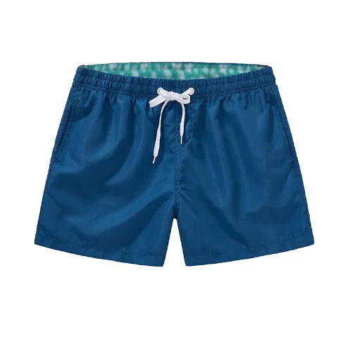 Men's straight leg polyester beach shorts in multiple colours with extended sizing options