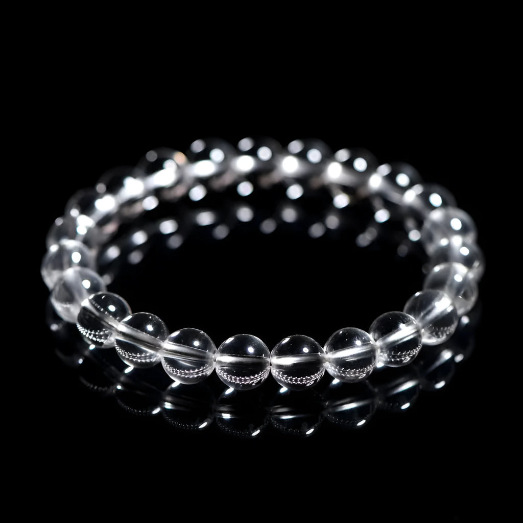 Natural Donghai white crystal round bead geometric bracelet on a wrist.