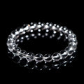 Natural Donghai white crystal round bead geometric bracelet on a wrist.