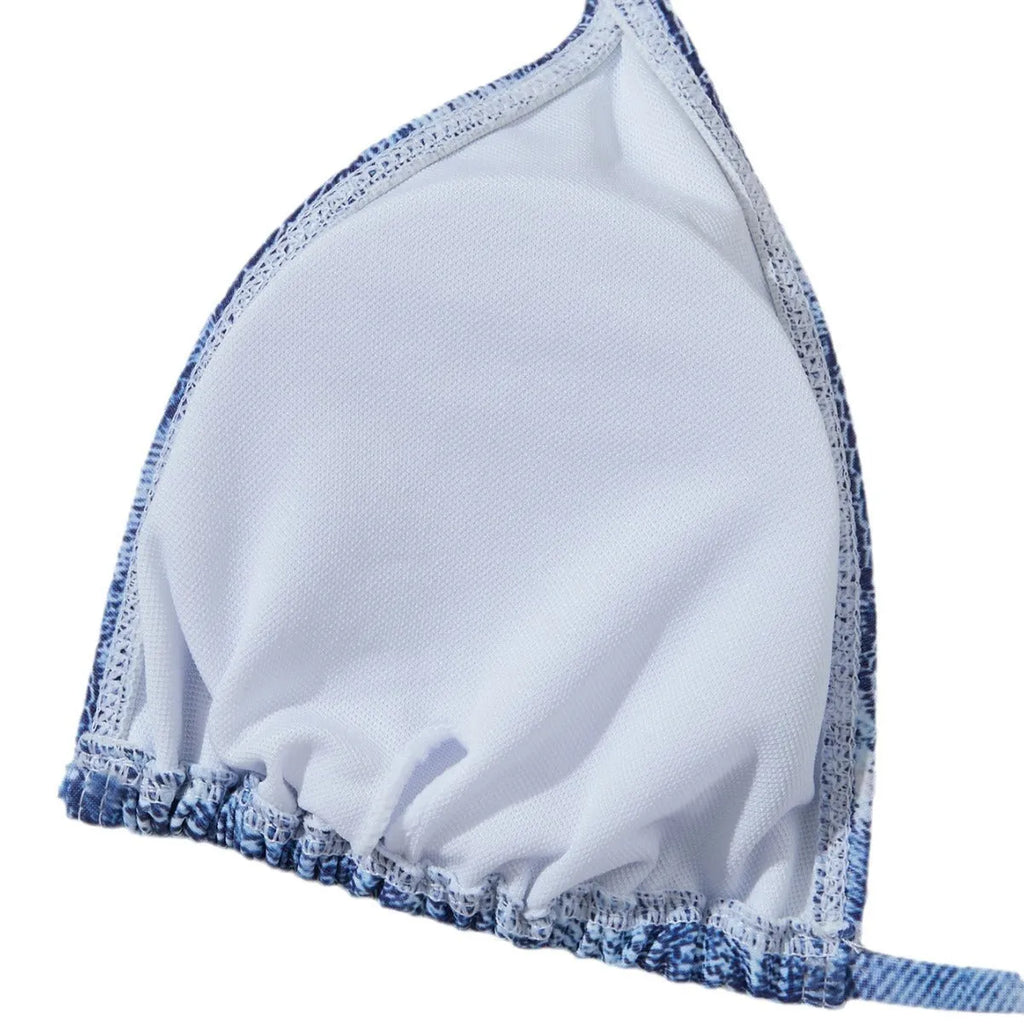 Women's denim blue printed bikini set with strap detail, made from nylon spandex fabric.