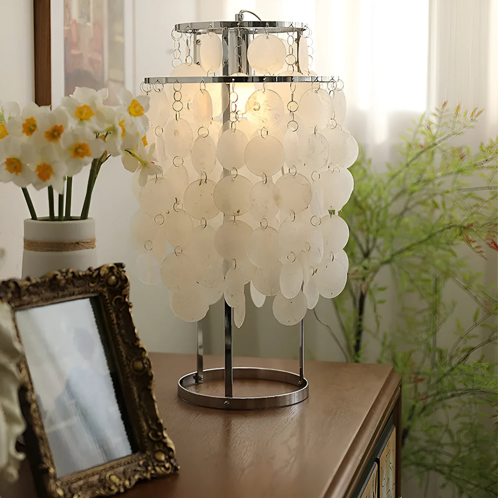 Modern shell-shaped table lamp in chrome or gold finish, 46cm tall.