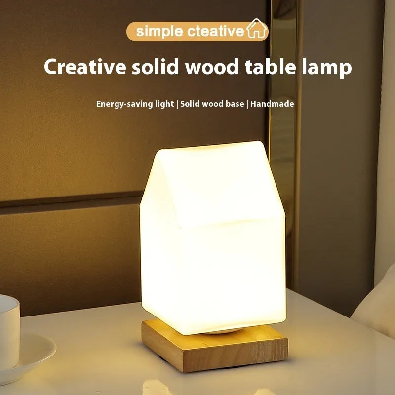 Nordic solid wood base USB table lamp in a choice of cube, column, cylinder, or ball shapes with touch dimming.