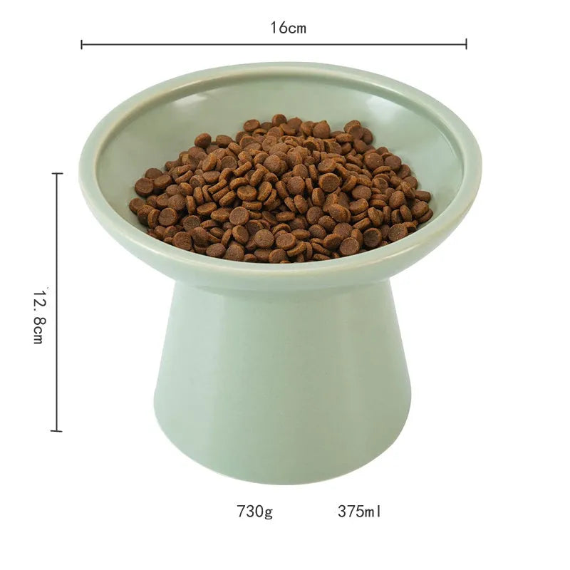 Ceramic elevated cat food bowl in blue colour with wide shallow design and raised base