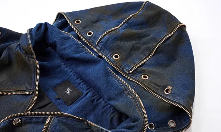Blue denim-style hooded vest coat with matching trousers laid flat as a two-piece set.