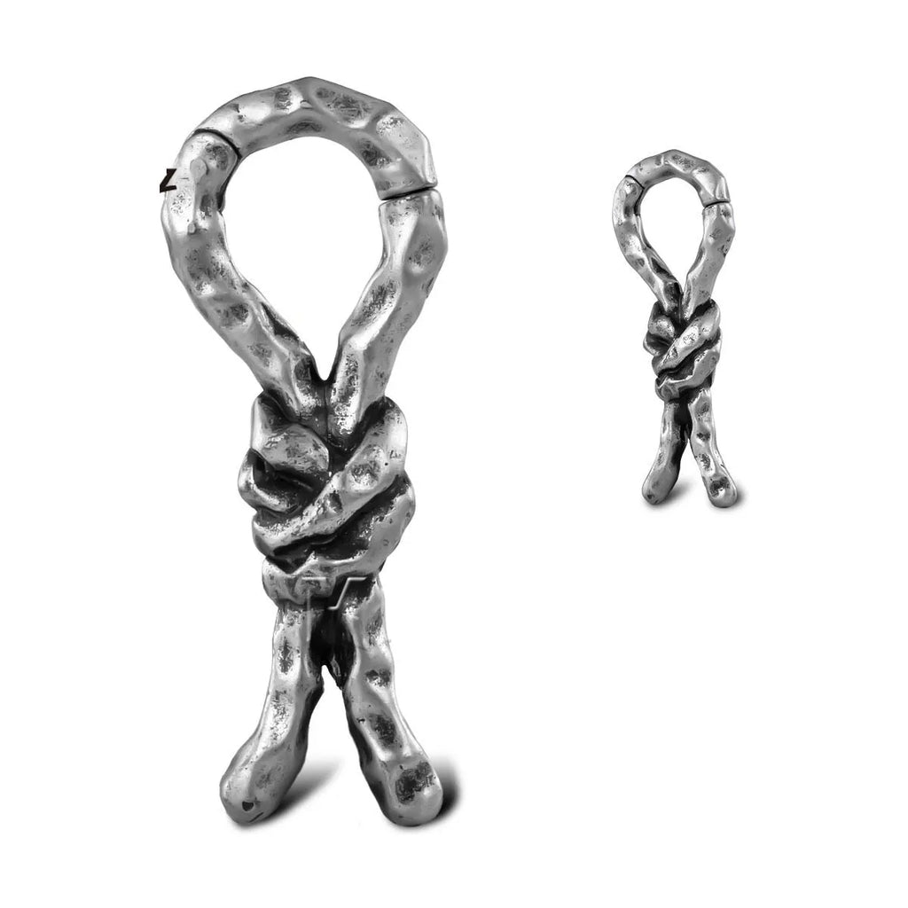 Close-up of 4mm copper bending and connecting earrings for auricle piercings.