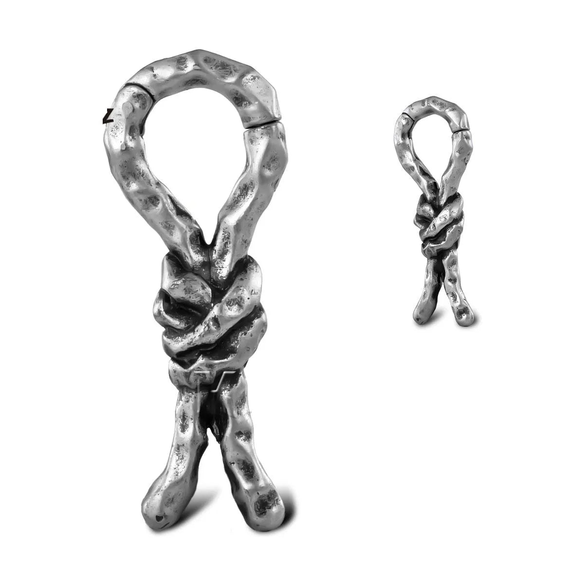 Close-up of 4mm copper bending and connecting earrings for auricle piercings.