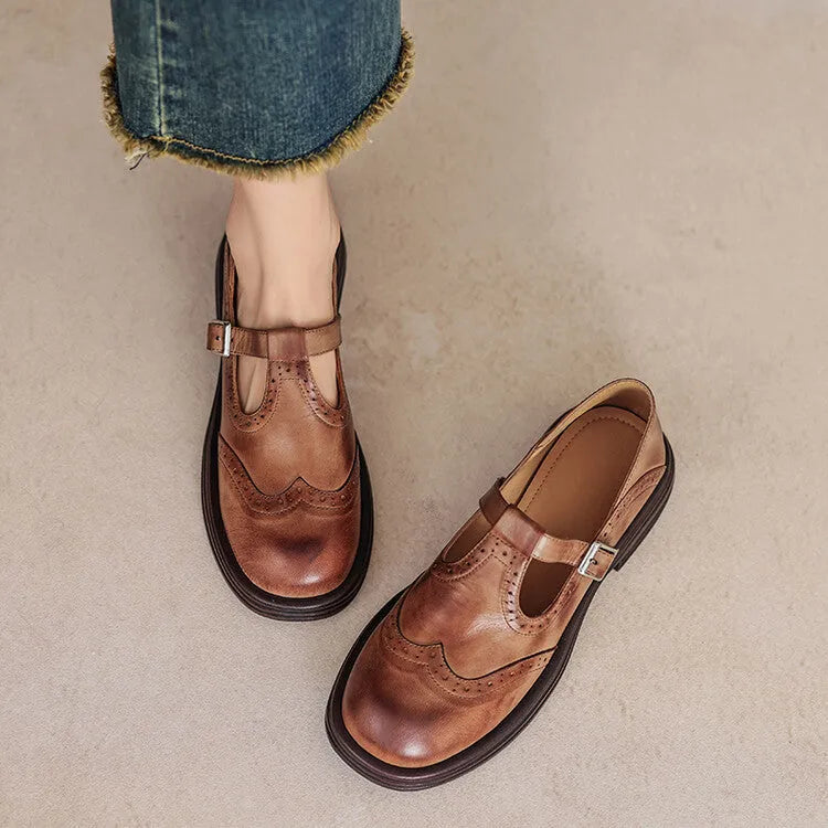 Women's brown sheepskin leather flat shoes with round toe design showing UK size label