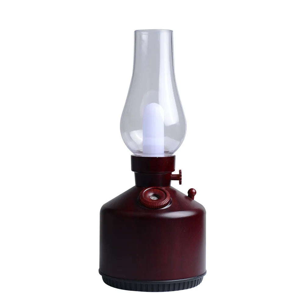 Kerosene lamp ultrasonic humidifier with grey ABS shell on a wooden desk showing single fog outlet