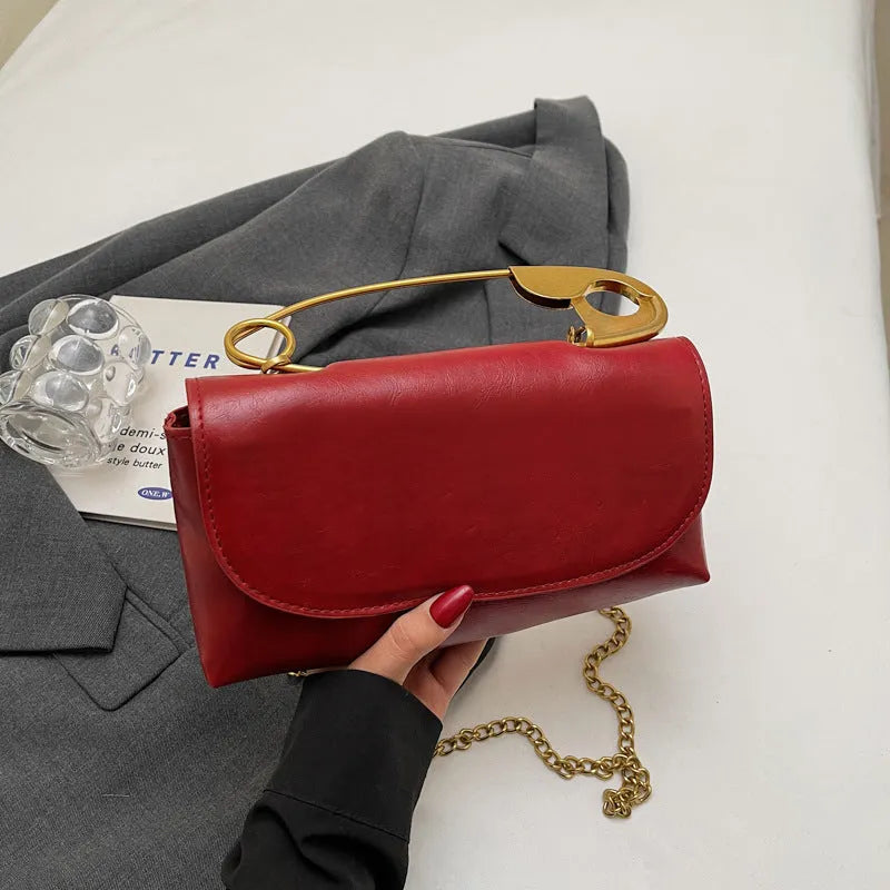 Creative paper clip design PU leather shoulder handbag in horizontal square shape with sandwich pocket